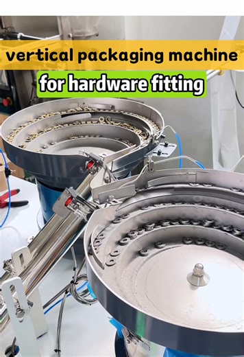 Vertical packaging machine, bulk hardware components combined packaging #VerticalPackagingMachine #GranulePackagingMachine #HardwarePackagingMachine #AccessoriesPackagingMachine #HardwareAccessories