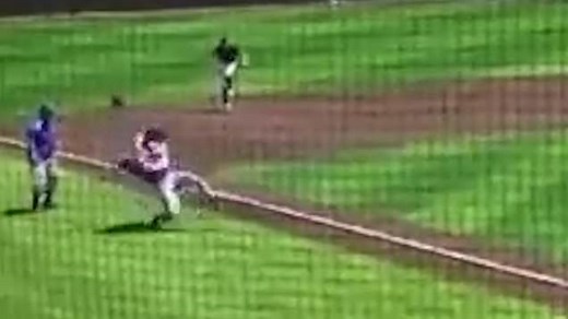 Shocking moment a Texas college pitcher tackles a baserunner