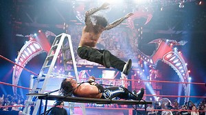 Jeff Hardy ties Matt Hardy to a table for a leg drop: Backlash 2009