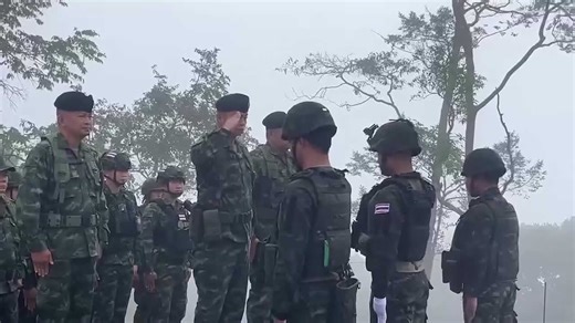 Thai soldiers salute flag and sing anthem along disputed border with Cambodia