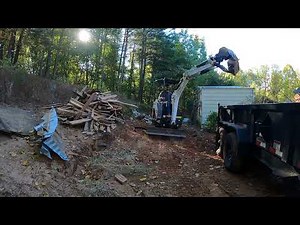 Bobcat E20 Cleaning up old Landscape