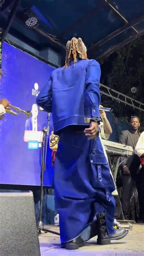 1.4K views · 21 reactions | Ugandan Singer Jose Chameleon made a surprise appearance on a rare outfit at comedy store , Uganda. The audience were surprised what the out might be called, looks like a skirt jean | JunubEye | Facebook