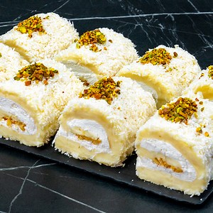 2.8M views · 8.8K reactions | No one believes that I make them myself! They turn out better than in pastry shops Ingredients: coconut flakes: 250 g (8.8 oz) LEAVE: 20 MIN whipping cream: 300 ml (10 fl oz) powdered sugar: 70 g (2.5 oz) cocoa: 40 g (1.4 oz) walnut: 100 g (3.5 oz) pistachio: 70 g (2.5 oz) The cream: flour: 220 g (7.8 oz) milk: 1 l (34 pt) sugar: 100 g (3.5 oz) vanilla essence: 10 ml (0.3 fl oz) butter: 100 g (3.5 oz) | Cookrate | Facebook