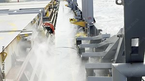 able seaman use high pressure machine for de rusting coamings of the ship's cargo hold 1