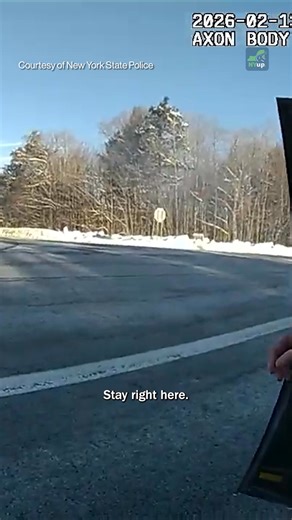 🔗 https://l.nyup.com/shx7tm Trooper Bailey Martin was outside her patrol vehicle in the Adirondacks on Feb. 13, 2026, when she was struck by an oncoming SUV. The terrifying crash captured on Martin's body camera shows the SUV blow through a stop sign and strike the trooper before smashing into her patrol vehicle in Duane, a small town near Saranac Lake. After Martin tumbles to the ground and groans in pain, an uninvolved man in a neon-yellow safety jacket checks on the injured trooper. “Goddamn