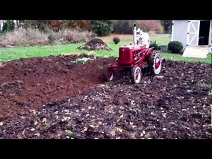plowing with 1952 Farmall Super A tractor
