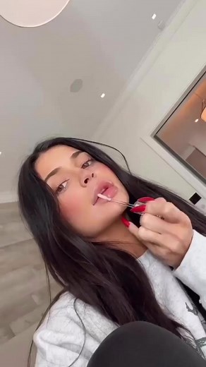 @kyliejenner using the smooth, non-sticky #kriscollection make it dirty lip serum. 🤍🫒 | Kylie Skin