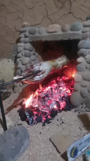 Outdoor Cooking: Roasting Beef Over Open Fire