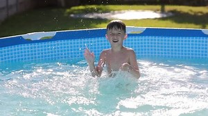Happy Child Boy Swimming Splashing Playfully Stock Footage Video (100% Royalty-free) 1075717436 | Shutterstock