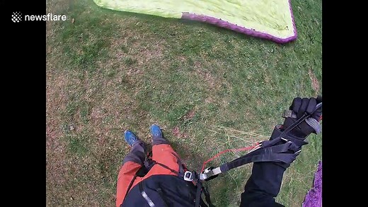 Watch this near-fatal paragliding fail where chute ALMOST didn't open
