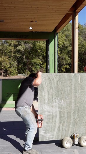 It takes a lot of muscle to install countertops, but the hard work pays off with the beautiful finished product. | Summit Stoneworks KC | Facebook