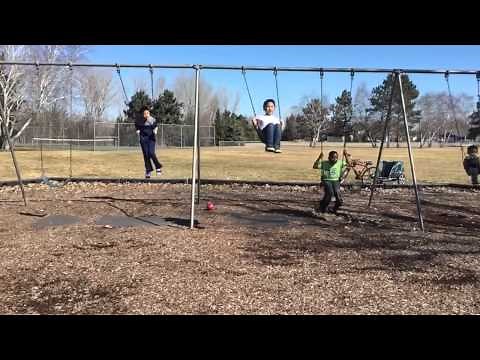 Boys Playground Jumping off Swing Slo-Mo Fun!