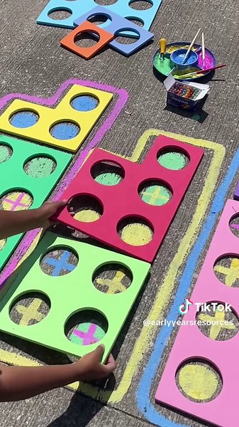 Numicon Towers Chalk Paint ☀️ Dive into the world of mathematics with our Large Numicon Foam Shapes. Mix crushed chalk and water to create chalk paint to outline the numicon towers and count the windows. How tall can you go? ‌ #ArtForKids #ChalkPaint #CraftsForkids#KidsActivities #SummerCrafts #fyp #DIY #HowTo #ChalkArt #IdeasForKids #TeacherTok