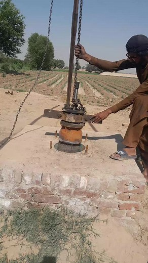 Drawing Water from a Well in Rural Landscapes