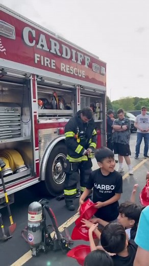 Walking our kids class students thru the process of donning turnout gear/SCBA during an emergency response 🚒 | Harbor Jiu-Jitsu