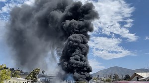 Fire at Recycling Center Sends Plume of Smoke Over Spring Valley