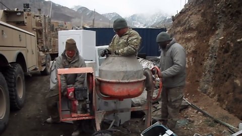 Man Goes for Spin in Cement Mixer