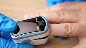 Saturation (the level of oxygen in the blood) is measured using a pulse oximeter.