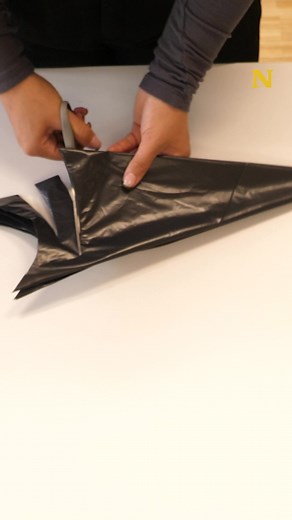 DIY Trash Bag Spider Web Tutorial for Halloween Decorations
