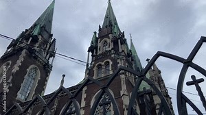 Church in neo-Gothic style, city of Lviv, Ukraine. Dome of the Orthodox Cathedral. Church architecture of Eastern Europe. Brick Neo-Gothic cathedral. High quality 4k footage