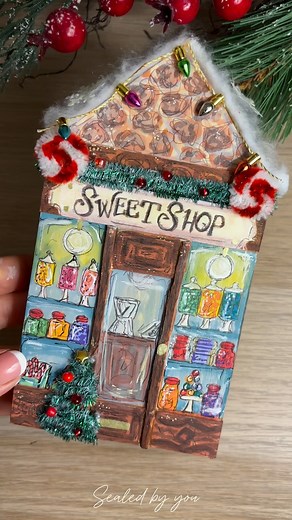Making my own Christmas Village🎄✨ Part 12- Sweet shop 🍬 Let me know what your favourite has been so far and what you’d like to see next! Supplies- Wooden houses- @woodyscrafts_ Pens/paint- Artecho acrylic paint pens #christmasvillage #artistni #christmasvillage #christmasvillage #christmasvillagedisplay #christmascraft #christmashouses | Sealed by you