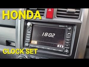 How do you set the clock in the Honda CRV?