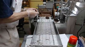 Covering Peanut Butter Oreos in Chocolate with Our New Enrober!