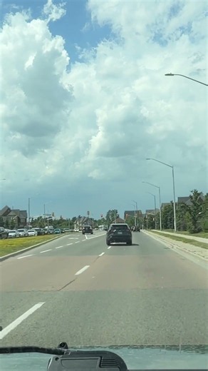 Drives over curb in front of OPP then runs red light #brampton #toronto #ontario #canada #traffic