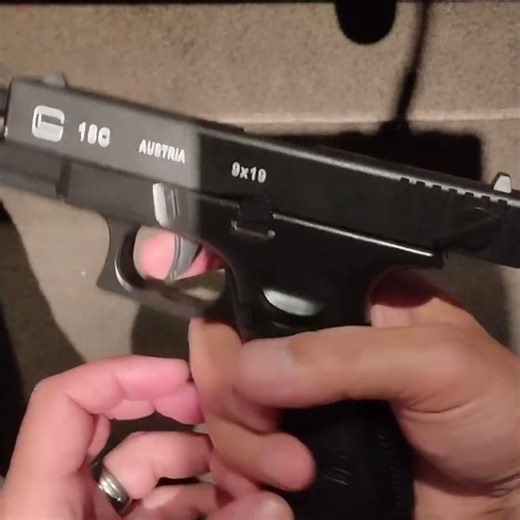 Glock style shell ejecting toy gun