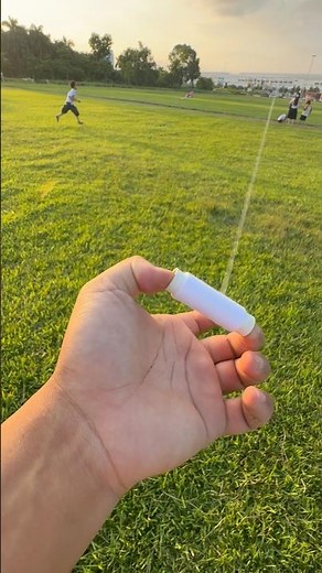 Holding the spool in my hand, letting the line out for the kite to fly high, and it pulled the wh...
