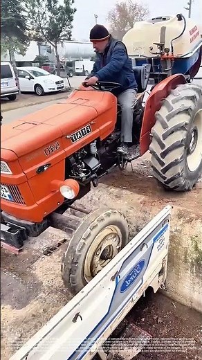 The Step-Down Load: How a Tractor Uses a Ramp to Board a Truck