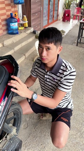 He's busy wiping down his motorbike, so who did that?😂🤣#funny #couple #family