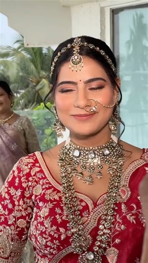 Archana Haria on Instagram: "A perfect red bridal dream come true ❤️ Glowing skin, softly defined eyes with shimmer tones, and nude lips — creating a flawless balance of elegance and radiance✨ Finished with a sleek low braid and statement Kundan jewellery that exudes regal charm💖 Makeup & Hairstyle: @archanaharia5 Jewellery: @archanahariarentals Bride: @letsjamforlife [bridal makeup, red wedding bride, braid lover, Indian wedding makeup, Indian bride, bride 2025, Indian wedding bride] #archanah