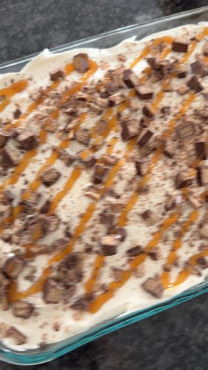 Made a candy bar poke cake for my brother’s birthday using our vanilla cake recipe—and it was a total hit! 🍫🎉 What makes it extra fun? You can switch it up with your favorite candy bar for endless variations! I went with Kit Kats, but honestly, anything goes! https://thestayathomechef.com/most-amazing-vanilla-cake/ | The Stay At Home Chef