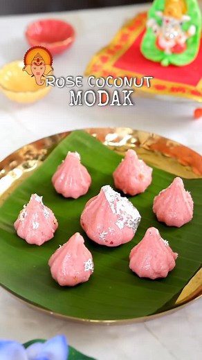 Payal P on Instagram: "🌸🥥 ROSE COCONUT MODAK – Festive Delight in Every Bite!🥥🌸 Ganesh Chaturthi is incomplete without the sweetness of modaks, and this time I tried something special – **Rose Coconut Modak** 💖 A beautiful fusion of tradition and a hint of floral freshness! 🌹✨ Made with desiccated coconut, milk powder,rose syrup/essence, condensed milk (or jaggery for a healthier twist), and a touch of ghee, these modaks are not just easy to make b