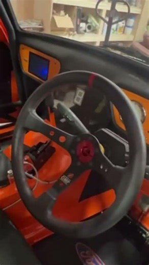 V8 home made Ford Anglia is gleaming.