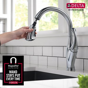 MagnaTite® Docking: May the Force Be with You It is a smart technology from Delta that makes the kitchen faucet pull-down spray wand dock snugly back into place when not in use. Why is this technology a big deal? In the olden days, wands would lose their snap after a while—they tended to sadly hang down, like the branches on a Christmas tree in mid-January. It was annoying. Users would have to physically push upward to get the sprayer back in place or else it would continue to hang. No one needs
