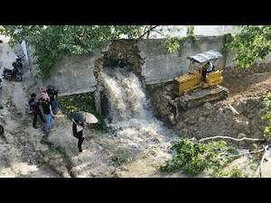 Small Dozer Pushing Mud Soil Filling Land Stop The WaterFlow
