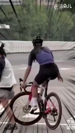 WAIT FOR IT… Cyclist Does Impossible Balance Trick at Traffic Light