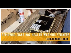 Removing health warning stickers from cigar boxes
