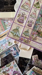 1.1K views · 78 reactions | Two kits. Endless fairy-tale vibes. ✨栗‍♀️  With the Fairy Boutique Album Kit, build a Square Tag & Pocket Wrap-Around Album.  With the Fairy Boutique Card Kit, create 6 Standing Frame Cards. Album makers vs. Card makers — drop your team below!  Both kits were designed by the fabulous and talented @carla.lavera #Graphic45 #FairyBoutique #AlbumKit #CardKit #papercrafting #scrapbooking #cardmaking #clubg45 | Graphic 45 | Facebook