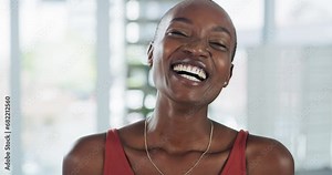 Face, smile and happy black woman laughing in a house with feel good mood, confidence or positive attitude. Laughter, humor and portrait of African female person with silly personality or optimism