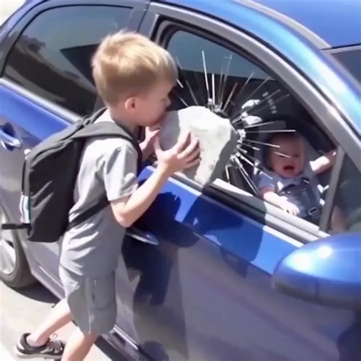 On a scorching 100°F morning, 9-year-old Ethan Miller saw a baby trapped in a hot car. Knowing he’d be late and lose his Golden Star award, he smashed the window, rescued the baby, and called 911. He arrived at school 12 minutes late, soaked and bleeding, only to face detention for breaking the rules he always followed. (Check In First comment👇) Made with AI | Alexandra Agiurgiuculese