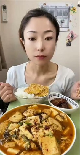 Spicy Tofu Stew With Rice And Egg Topping