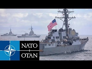 US Navy. Powerful NATO ships in a live firing exercise in the Atlantic Ocean.