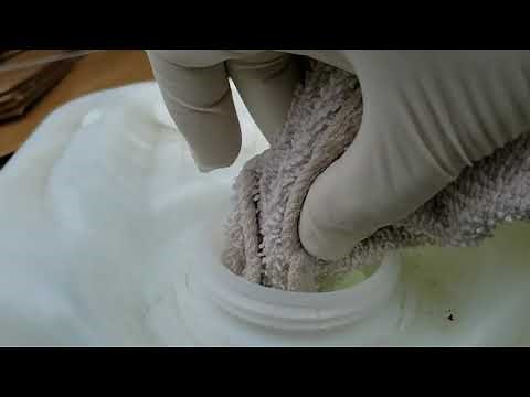 Rust removal demo on bronze statue.