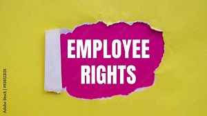 Employee rights message writing on ripped torn yellow paper on pink background. Conceptual employee rights symbol.