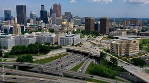 Timelapse of Atlanta Ralph David Abernathy Freeway with Georgia State Capitol government office and Downtown Atlanta skyline buildings and skyscraper in view, Georgia, USA