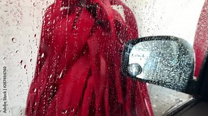 Footage of a car being cleaned inside a car wash. Stock Video