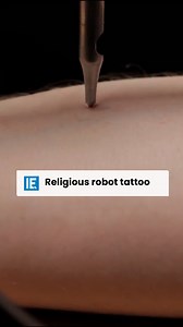 This robot will tattoo a religious symbol on you, but you can’t pick which. | Interesting Engineering